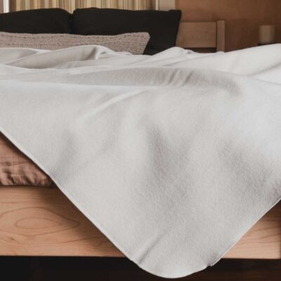 Shepherd's Dream Merino Wool Blanket on organic bedding