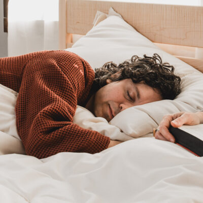 Man sleeping on cotton encased wool pillow
