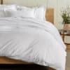 Bedroom with white duvet