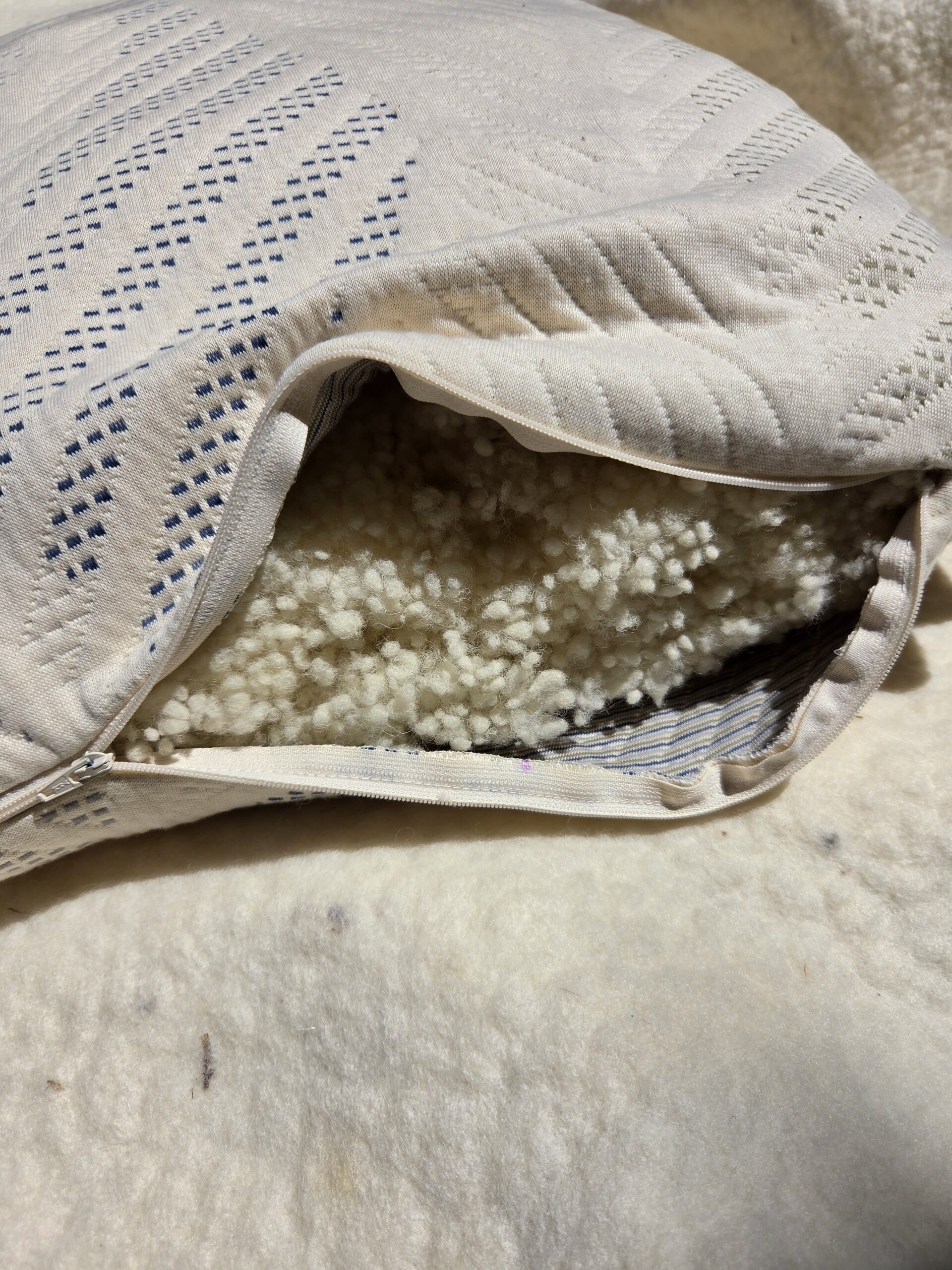 Wool Down Pillow by Shepherd's Dream with 100% organic cotton stretch knit fabric opened at the zipper