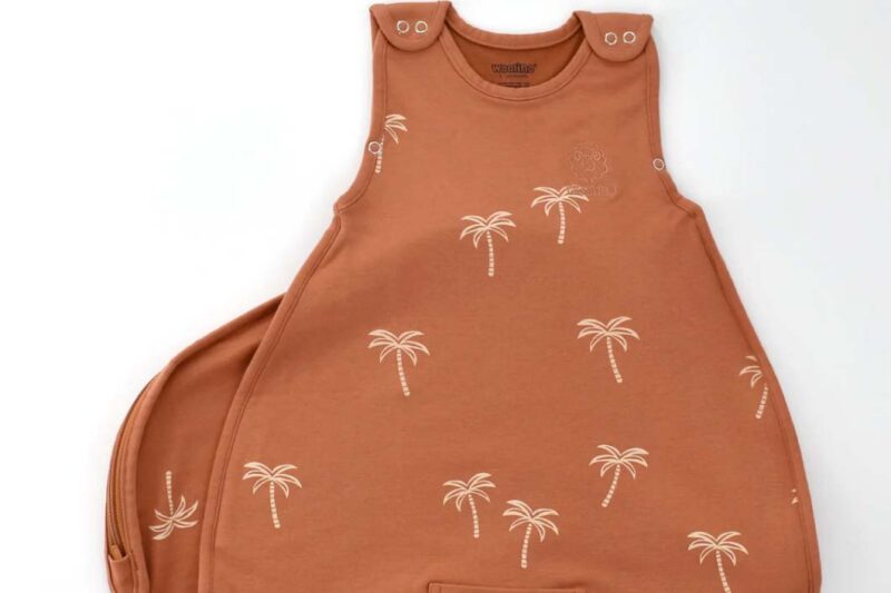 Baby sleep sack with palms print in rust orange