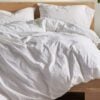 Organic bedroom with organic cotton sheets in white