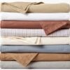 Stack of various colors of organic cotton sheets