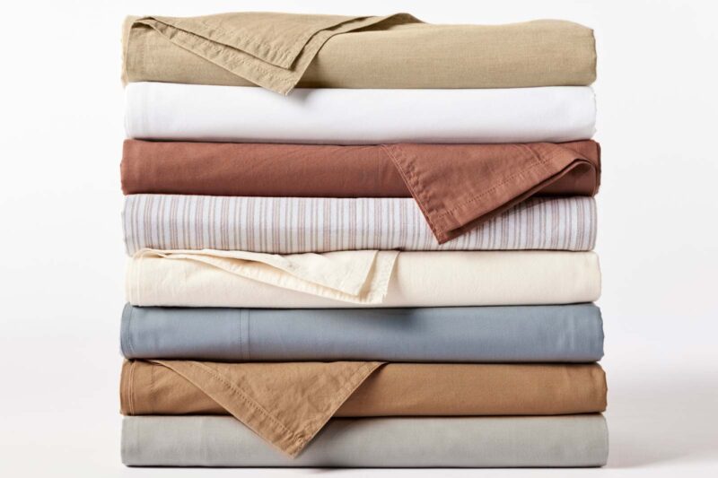 Stack of various colors of organic cotton sheets