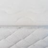Zipper detail image of organic cotton cover on organic wool mattress.