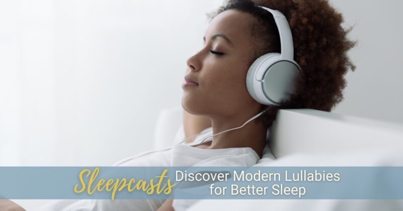 A young woman serenely leans back against the headboard of her bed while wearing headphones.