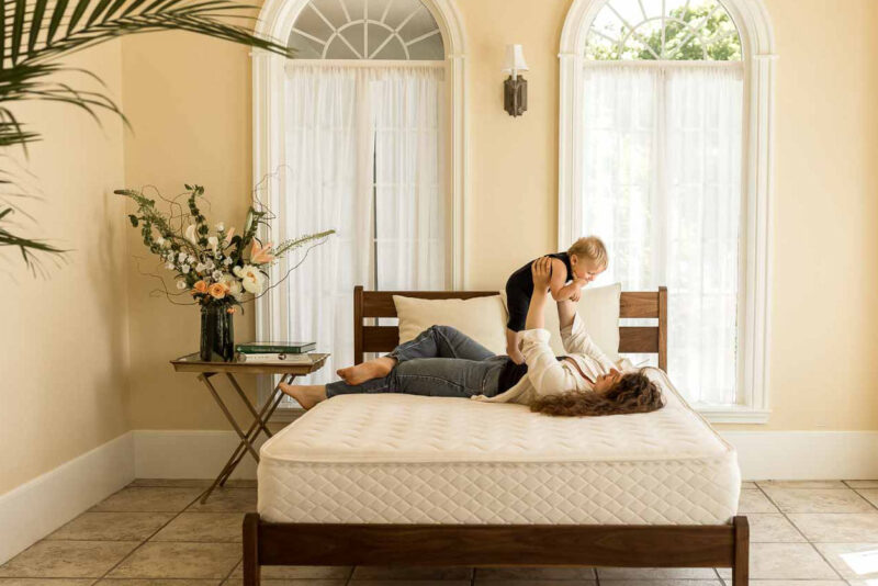 Mother and son on a natural latex mattress