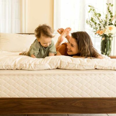 Mother and son on a natural latex mattress