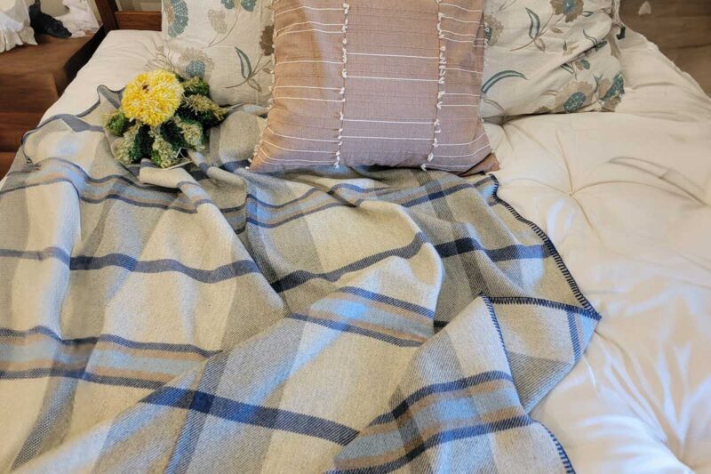 Merino wool blanket on a bed