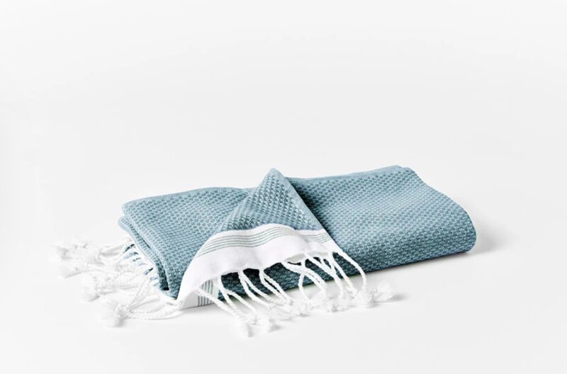 Coyuchi Mediterranean towel in Aquamarine with Seaspray Stripes