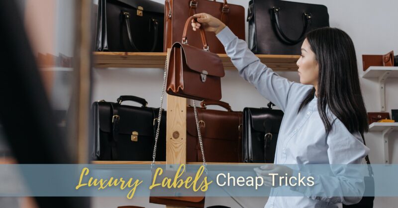 A woman holds up and examines a leather purse in a store.
